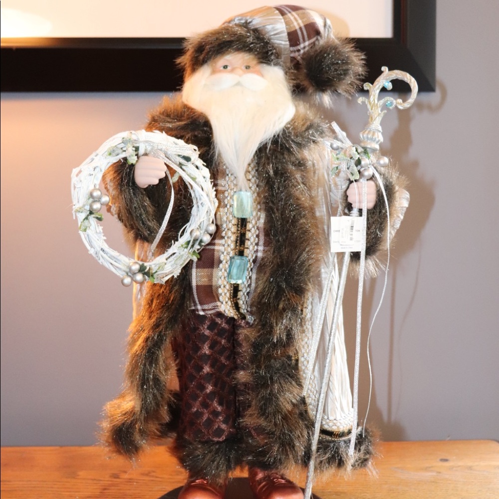 SANTA CLAUS HOLDING A JEWELED STAFF AND WREATH